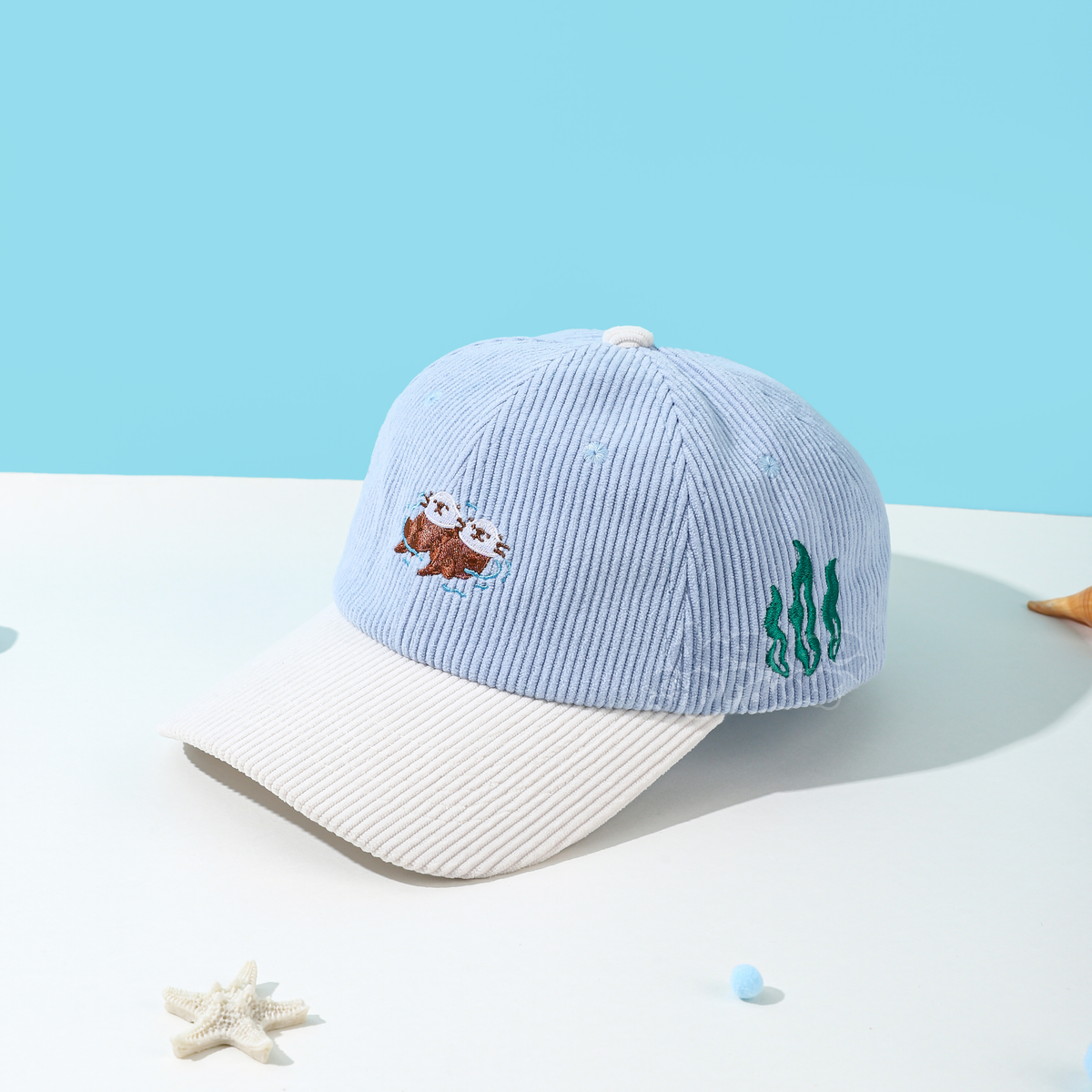 Floating Otters Dad Hat