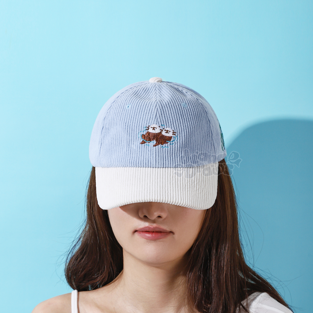 Floating Otters Dad Hat