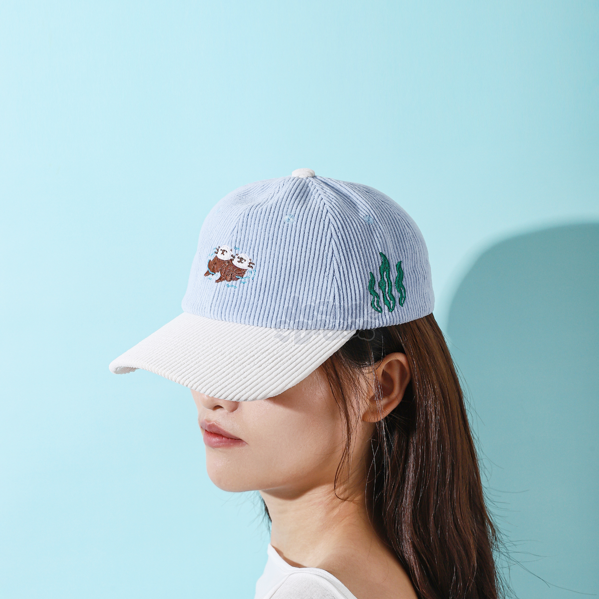 Floating Otters Dad Hat